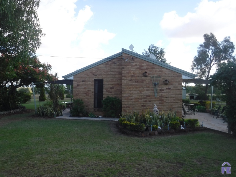 5 acres with tidy brick home