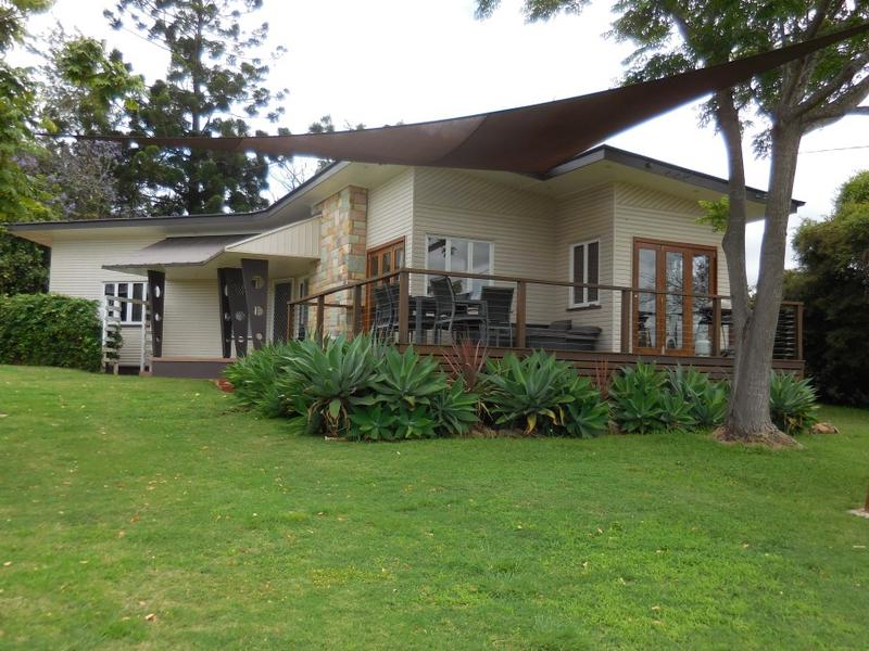 RENOVATED HOME  WITH THE BEST VIEWS TO THE BUNYA  MOUNTAINS.