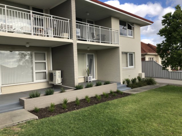 GROUND FLOOR UNIT IN WELL MAINTAINED SMALL COMPLEX